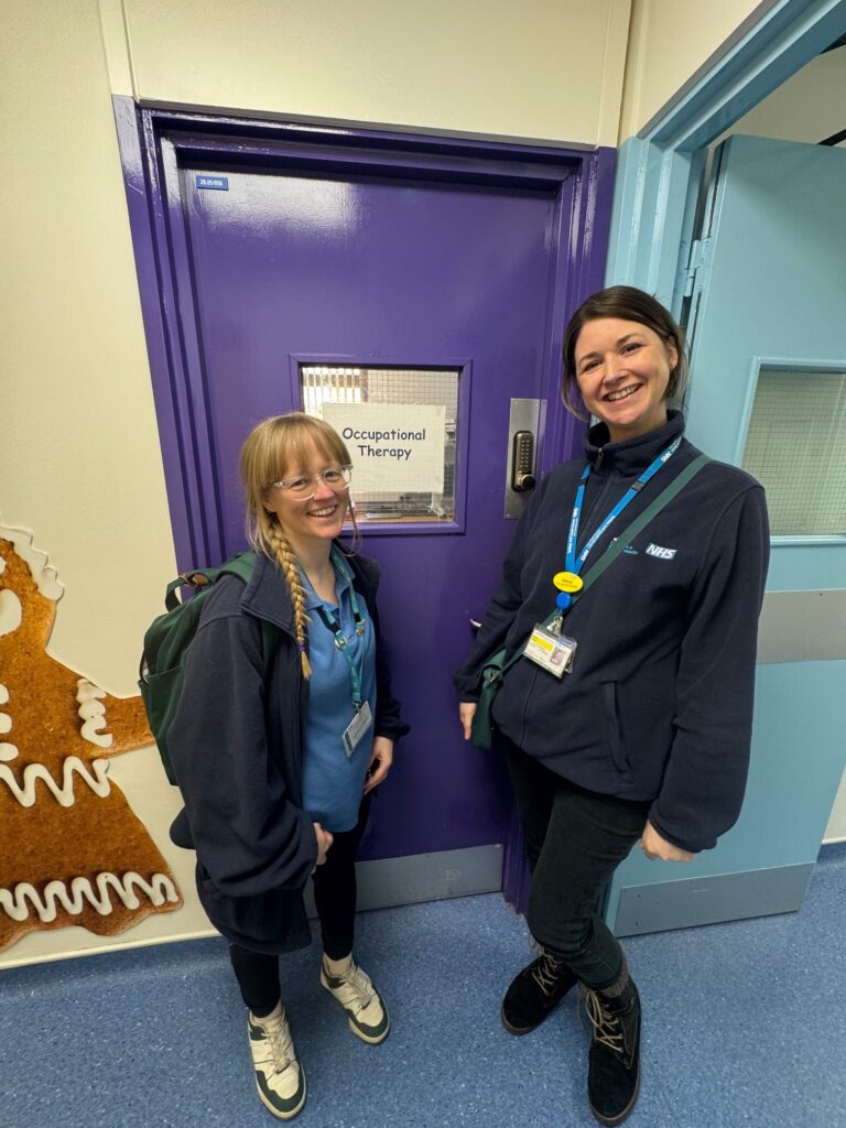 Jessica and Rianne standing outside the CFHD occupational Therapy office